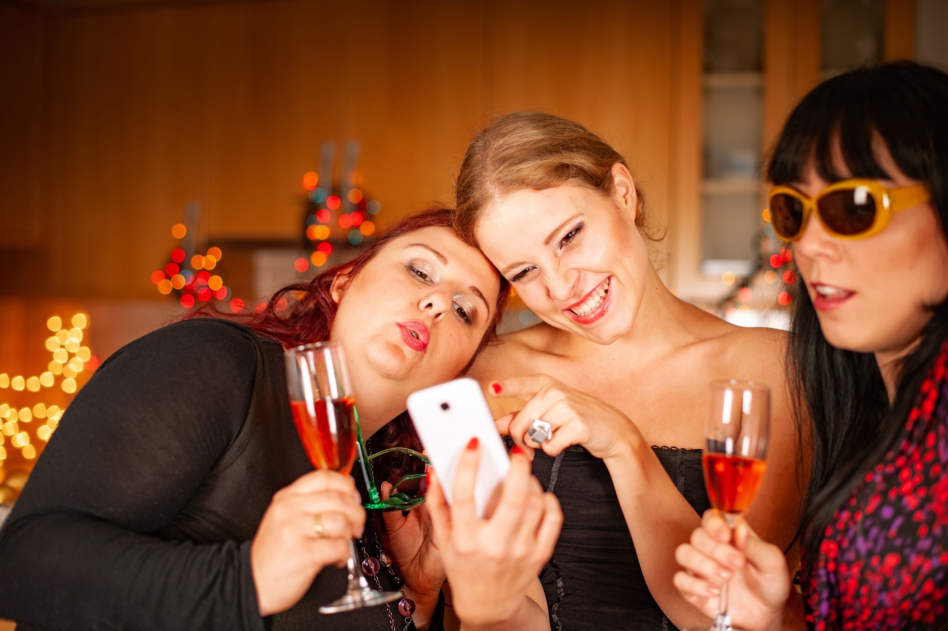 Girls taking a Selfie on Christmas Party